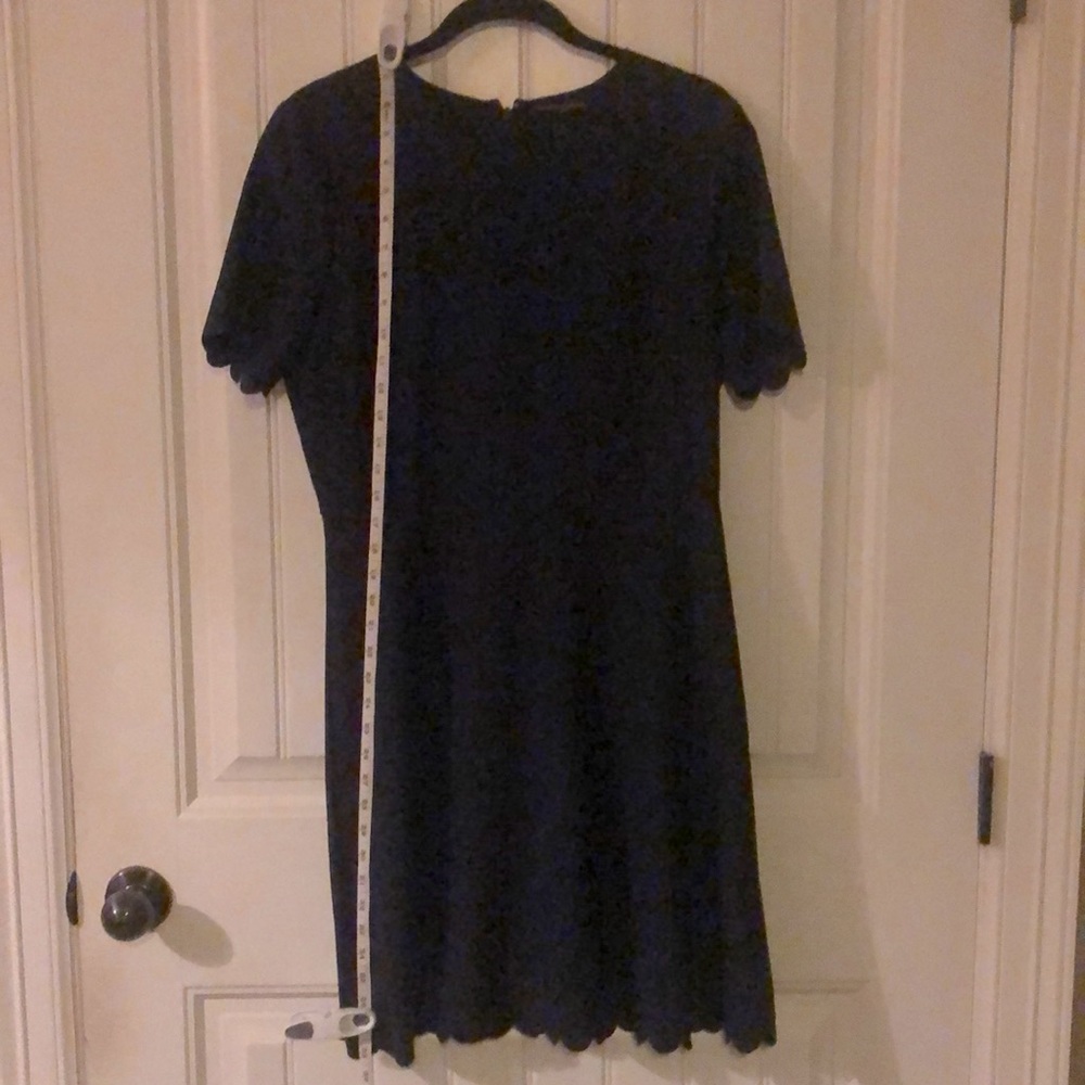 Banana Republic scalloped edge arms and hem.